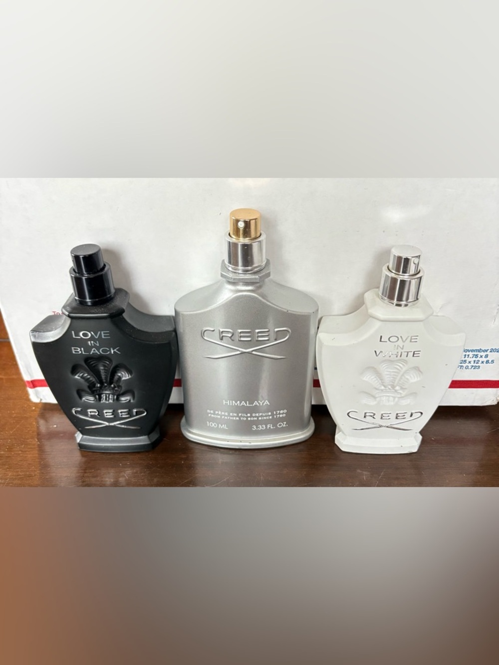 Creed Trio: Black, Silver & White Signature Bottles 3 empty bottles for $90